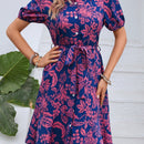 Vestido camisero con estampado floral de manga farol con cinturon