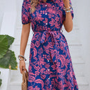 Vestido camisero con estampado floral de manga farol con cinturon