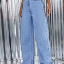 Jeans de talle alto bajo crudo de pierna ancha