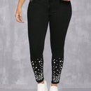 Pantalones ajustados con cuentas de perlas