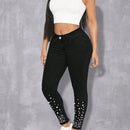 Pantalones ajustados con cuentas de perlas