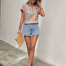 LUNE Blusa con estampado floral de cuello notch de manga murcielago