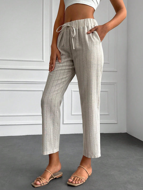 Pantalones con estampado de rayas con bolsillo oblicuo crop