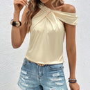 Blusa girante delantero de cuello asimetrico unicolor