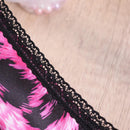 Tanga con estampado de leopardo unido en contraste