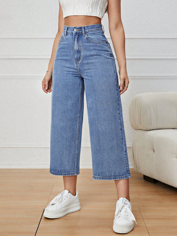 Jeans unicolor con cremallera