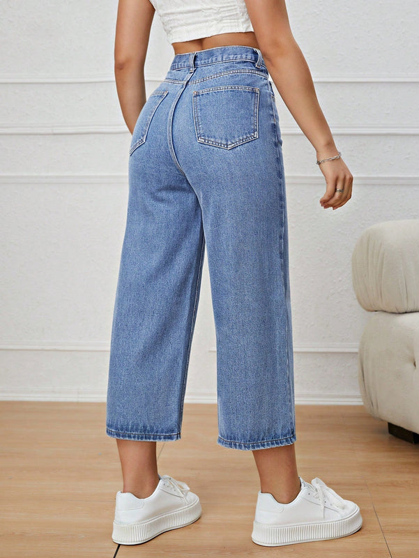 Jeans unicolor con cremallera