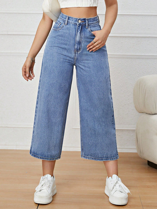 Jeans unicolor con cremallera
