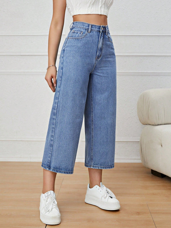 Jeans unicolor con cremallera