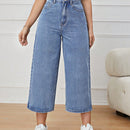 Jeans unicolor con cremallera