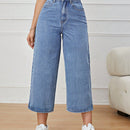 Jeans unicolor con cremallera