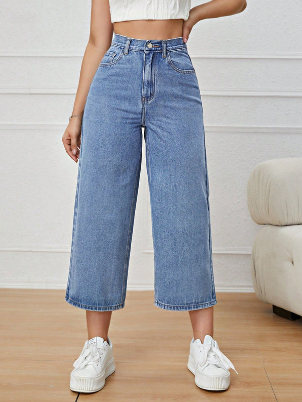 Jeans unicolor con cremallera