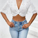 Prive Blusa girante delantero ribete con pompon crop schiffy