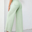 Jeans unicolor bajo crudo de pierna ancha