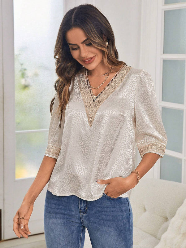 Blusa de lunares jacquard con encaje de manga farol de saten