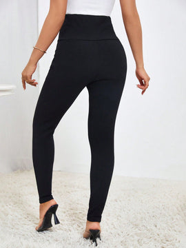 Pantalones ajustados de talle alto ultra con diseno de boton