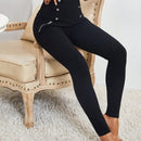 Pantalones ajustados de talle alto ultra con diseno de boton