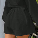 Shorts de pierna ancha unicolor de cintura con cordon