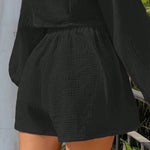 Shorts de pierna ancha unicolor de cintura con cordon