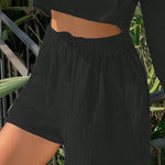 Shorts de pierna ancha unicolor de cintura con cordon