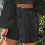 Shorts de pierna ancha unicolor de cintura con cordon
