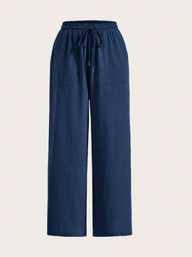 Pantalones sueltos de pierna ancha de color solido para mujer con dobladillo fluido, estilo casual