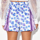 Anna Maria Gjoka Shorts de pierna ancha con estampado floral con diseno de fruncido