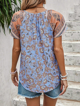 LUNE Blusa con estampado floral de cuello con cordon de manga raglan