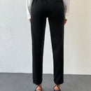 Pantalones conicos con cinta con letra