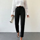 Pantalones conicos con cinta con letra