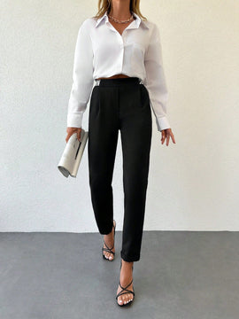 Pantalones conicos con cinta con letra