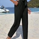 Pantalones conicos unicolor con cordon delantero