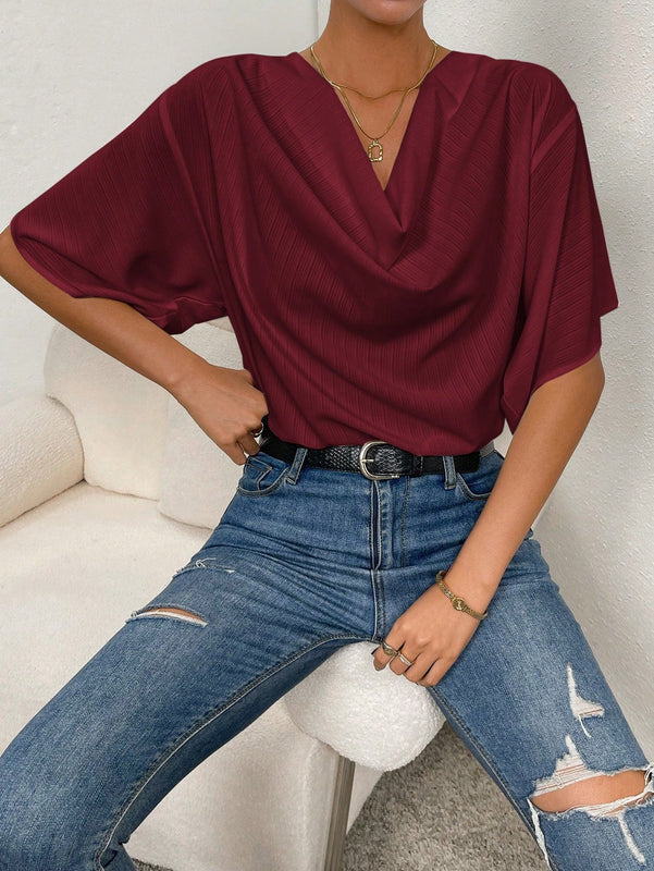 Essnce Blusa unicolor escote drapeado de manga murcielago