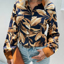 LUNE Camisa con estampado tropical con boton delantero