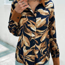 LUNE Camisa con estampado tropical con boton delantero