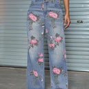 Jeans de pierna recta con bolsillo inclinado y estampado floral vintage