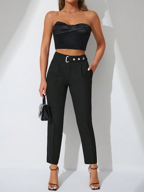 Pantalones zanahoria con bolsillo oblicuo liso
