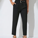 Pantalones zanahoria con bolsillo oblicuo liso