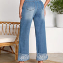 LUNE Jeans con bordado floral de pierna ancha