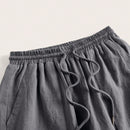 Pantalones sueltos de pierna ancha de color solido para mujer con dobladillo fluido, estilo casual