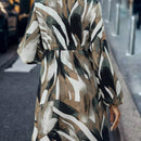 Vestido smock con estampado de cuello con cordon de manga farol