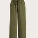 Pantalones sueltos de pierna ancha de color solido para mujer con dobladillo fluido, estilo casual