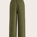 Pantalones sueltos de pierna ancha de color solido para mujer con dobladillo fluido, estilo casual