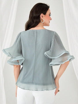 Blusa unicolor de manga amplia