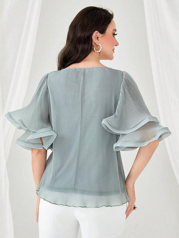 Blusa unicolor de manga amplia