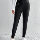 Essnce Pantalones ajustados cremallera con diseno de aro O