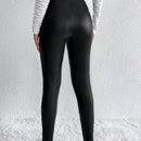 Pantalones ajustados cremallera con diseno de aro O