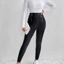 Essnce Pantalones ajustados cremallera con diseno de aro O