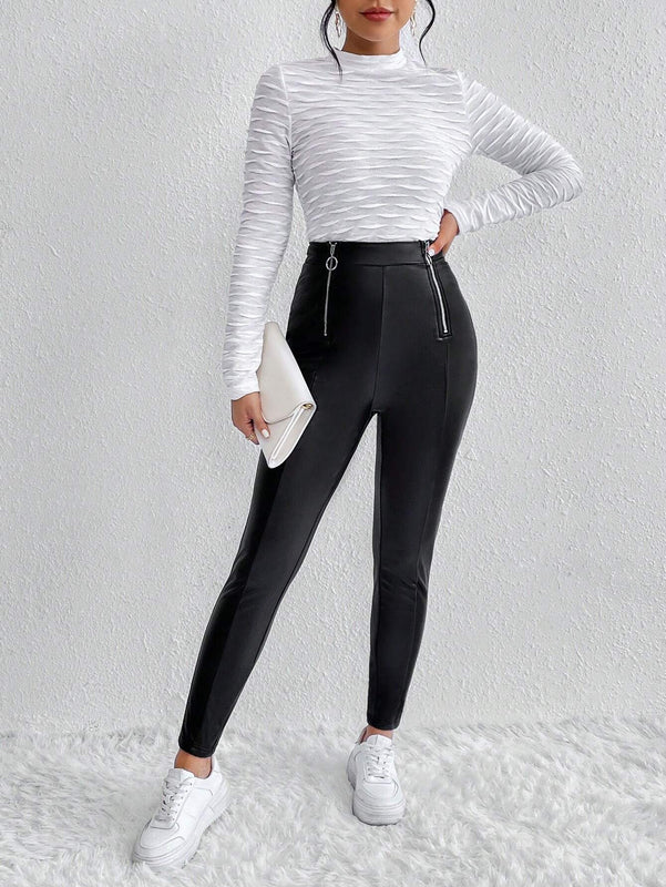 Essnce Pantalones ajustados cremallera con diseno de aro O