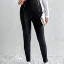 Essnce Pantalones ajustados cremallera con diseno de aro O